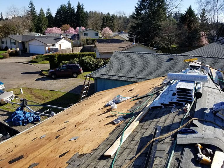 Bare roof deck exposed after tear-off